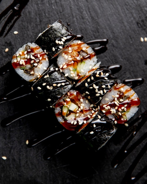 Maki Roll with Cucumber, Sauce, and Sesame Seeds – Free Stock Photo Download