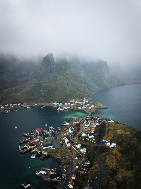 Vertical Aerial View of Lofoten Town in Norway Captured in Fog – Free Download