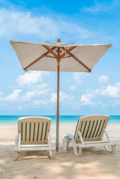 Beautiful Beach Chairs with Umbrella on Tropical White Sand – Free Download