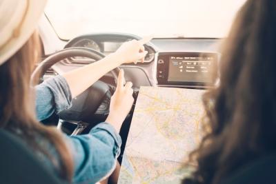 Young Female Driving Car with Map – Free Stock Photo, Download for Free