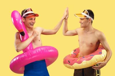 Half-Length Portrait of Smiling Friends with Swim Rings – Free Stock Photo Download