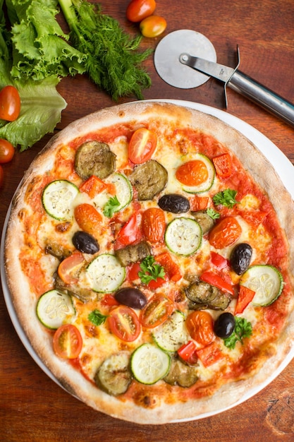 Delicious Vegetarian Pizza with Peppers and Assorted Olives – Free Download