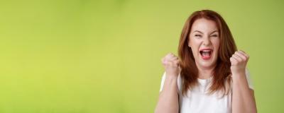 Joyful Lucky Redhead Middle-Aged Female Celebrating Success – Free Download