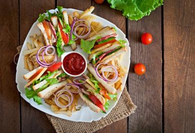 Delicious Club Sandwich with Cheese, Cucumber, Tomato, Smoked Meat, and Salami – Free Download