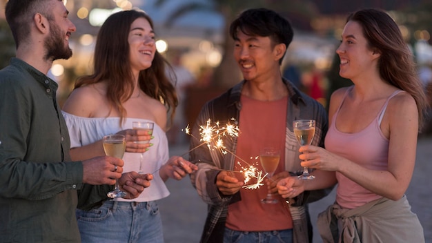 Friends Celebrating with Fireworks – Free Stock Photo for Download