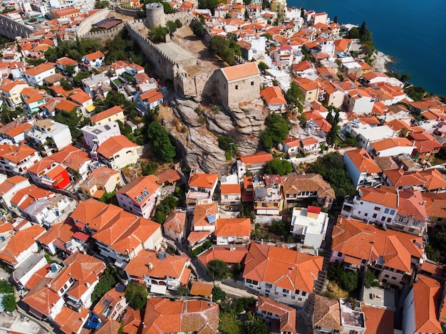 Multiple Buildings with Orange Roofs and Fort in Kavala, Greece – Free Stock Photo for Download