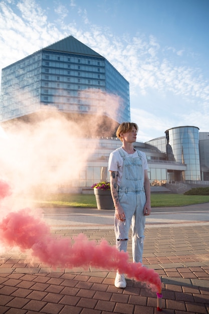 Pink Smoke Background Featuring a Young Adult – Free Download