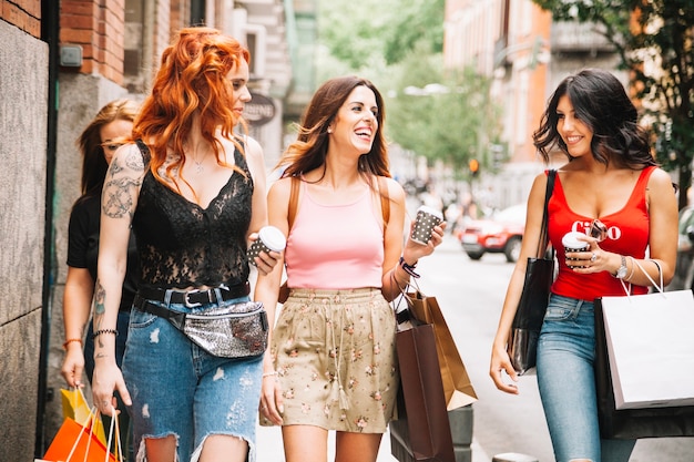 Women Enjoying Coffee and Carrying Bags – Free Download, Free Stock Photo