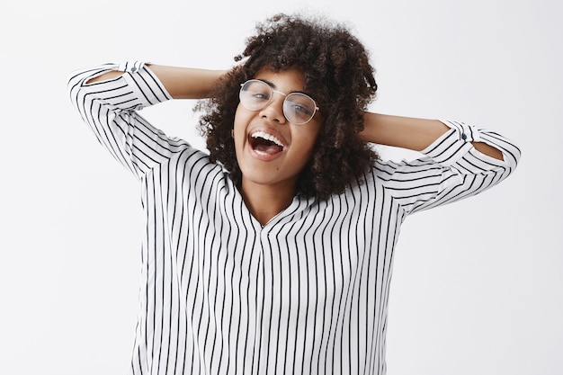 Carefree and Joyful Dark-Skinned Woman with Afro Hairstyle – Free Stock Photo, Download for Free