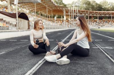 Beautiful Girls in Sportswear at the Stadium – Free Download Free Stock Photo