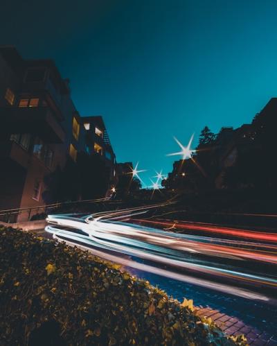 Timelapse of Car Lights on the Road at Night with a Blue Sky – Free Download