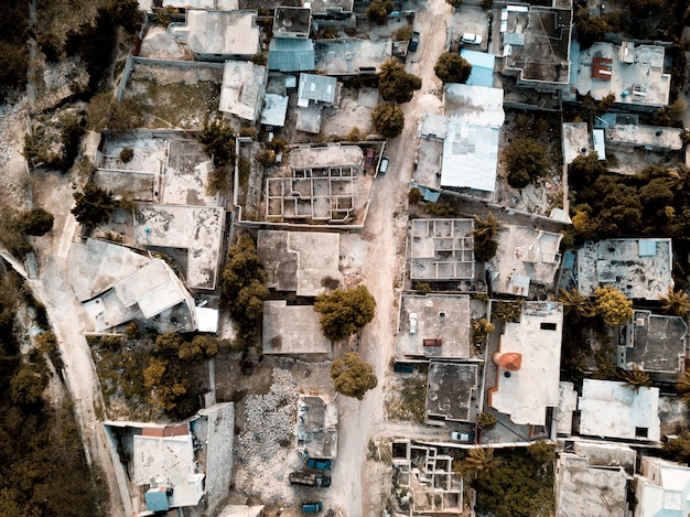 Overhead Shot of a Road Surrounded by Old Buildings and Trees – Free Download