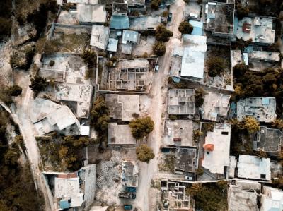 Overhead Shot of a Road Surrounded by Old Buildings and Trees – Free Download