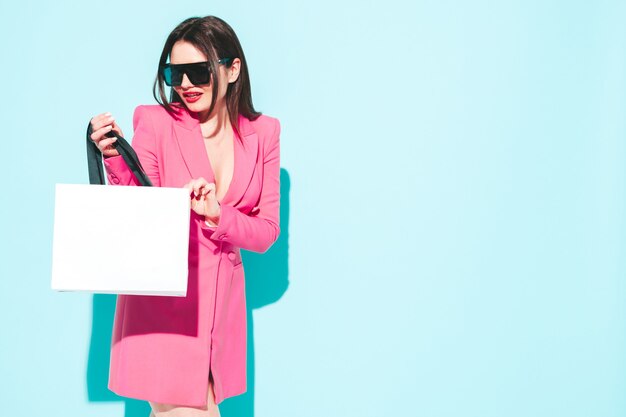 Beautiful Brunette Woman in Pink Summer Suit – Free Stock Photo for Download