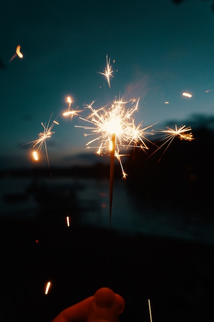 Person Holding Bengal Lights or Sparklers – Free Stock Photo for Download