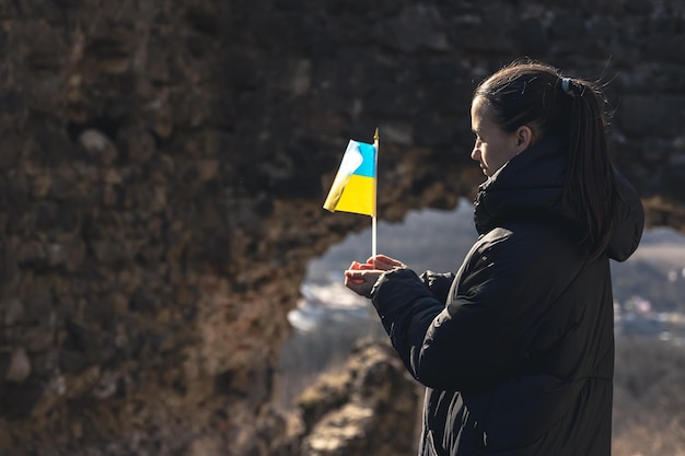 A Young Woman Holding the Ukrainian Flag – Free Stock Photo, Download Free