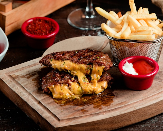 Delicious Meat Cutlet with Cheese and French Fries – Free Stock Photo for Download