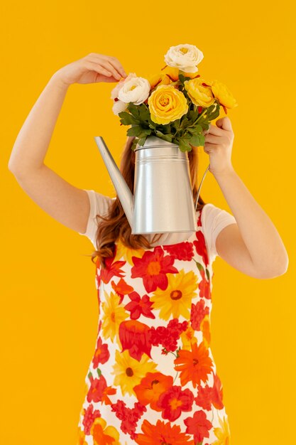 Model Holding Watering Can – Free Stock Photo for Download