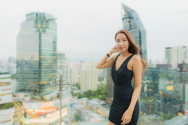 Beautiful Young Asian Woman Relaxing at Rooftop Restaurant – Free Stock Photo, Download Free