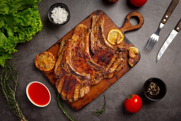 Roasted Pork Steak on Dark Surface – Free Stock Photo, Download Free Stock Photo