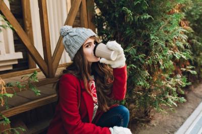 Pretty Girl in Red Coat Enjoying Coffee on Outdoor Wooden Stairs – Free Download