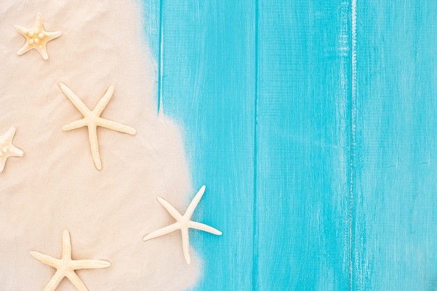 Stunning Starfish on Sand – Beautiful Blue Wooden Background | Free Stock Photo Download