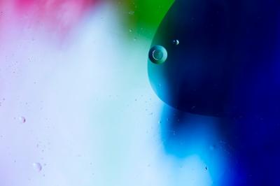 Coloured Liquid Abstract Background of Mixing Water and Oil – Free Download