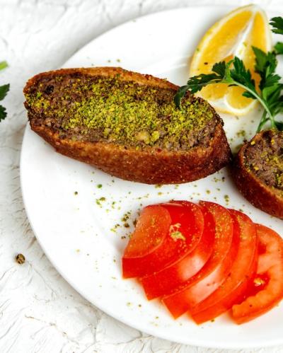 Fried Rolls with Pistachio Chips and Sliced Tomato – Download Free Stock Photo