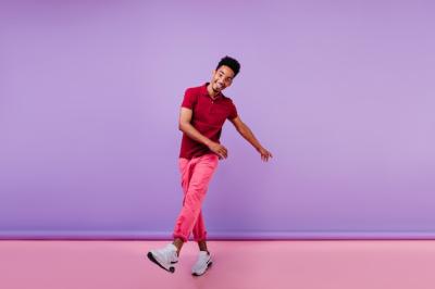 Joyful Sporty Guy in Pink Pants Dancing with Happiness – Free Download