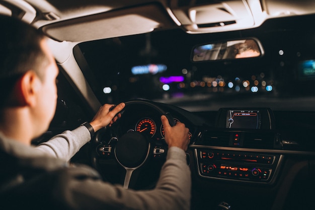 Young Man Driving His Car at Night – Free Stock Photo, Download Free Stock Photo