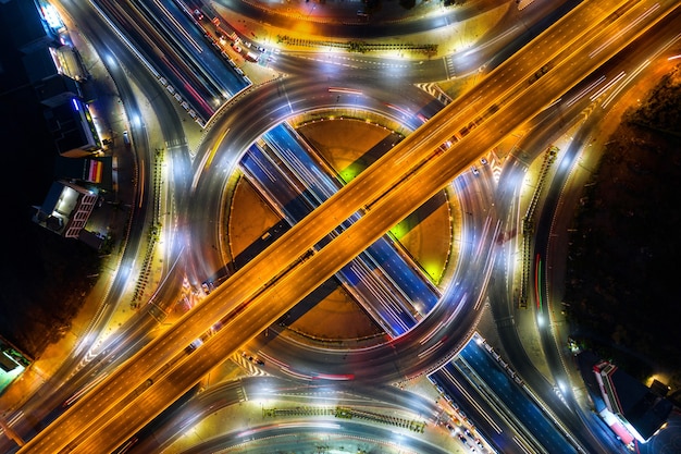 Aerial View of Nighttime Roundabout and Highway Traffic – Free Download