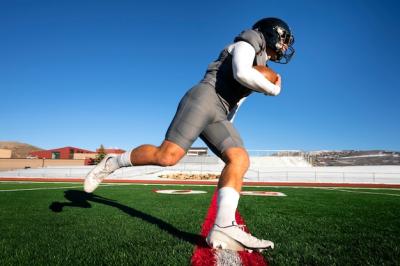 Male American Football Player in Uniform on the Field – Free Download