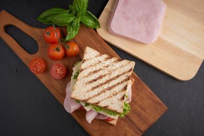 Grilled Sandwich with Ham, Cheese, Tomato, and Lettuce on Wooden Cutting Board – Free Stock Photo, Download Free