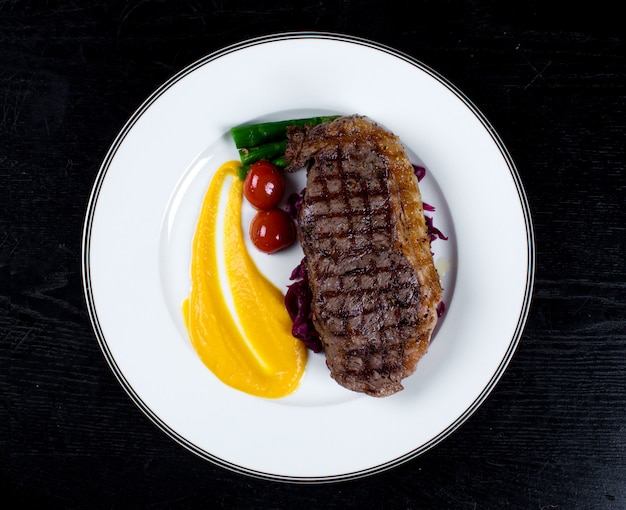 Well-done Steak Accompanied by Cherry Tomatoes and Asparagus – Free Download