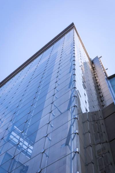 Stunning View of a Glass Building from Below – Free to Download