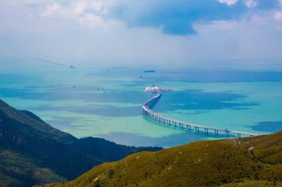 Aerial Shot of Lantau Island and Bridge Over the Ocean – Free Download