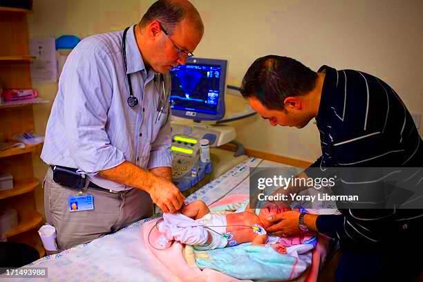 Kahldoon Odeh  a Palestinian from Beit Lehem holds his baby News 