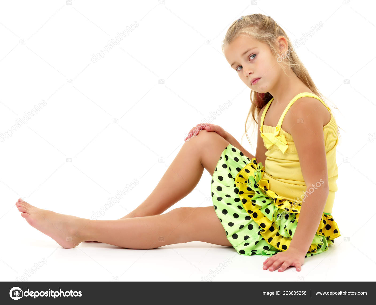 Little girl is sitting on the floor Stock Photo by lotosfoto1 228835258