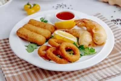 Side View of Squid and Shrimp Tempura on a White Plate – Free to Download