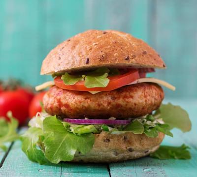 Juicy Chicken Burger Sandwich with Cheese, Tomato, and Red Onion – Free Download