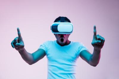 Young African-American Man in VR Glasses under Neon Lights – Free Stock Photo Download