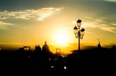 Cityscape Silhouettes with Street Lamp and Buildings at Sunset – Free Stock Photo, Download for Free