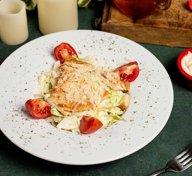 Chicken Caesar Salad with Chopped Parmesan, Lettuce, and Tomatoes – Free Download