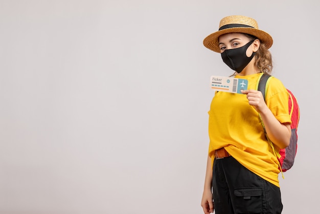 Young Woman with Black Mask Holding Travel Ticket – Free Download