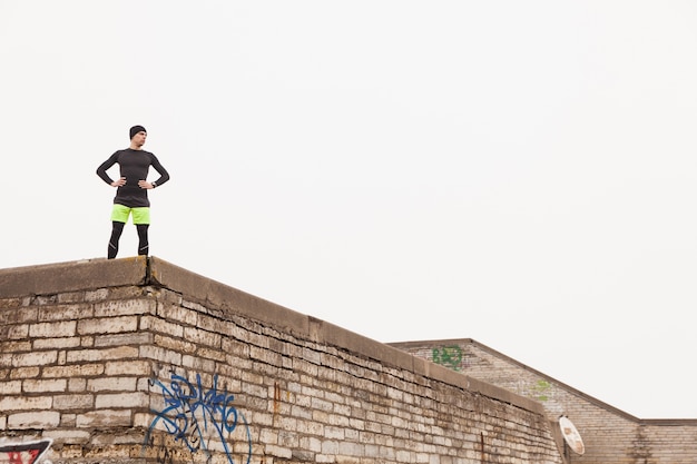 Jogger on Rooftop – Free Download Free Stock Photo