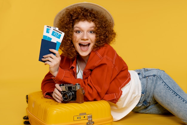 Smiley Woman Holding Passports – Free Stock Photo for Download