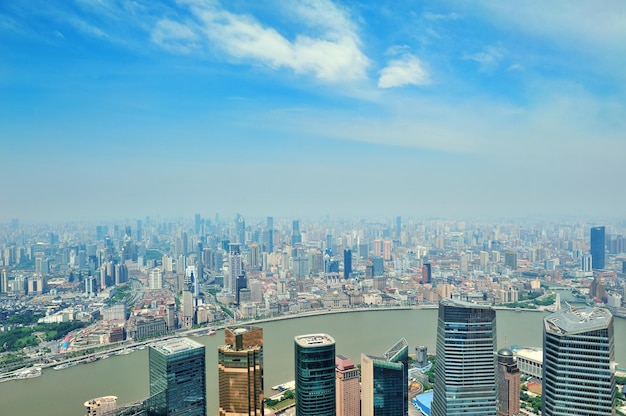 Stunning Aerial View of Shanghai City Under a Blue Sky – Free Download