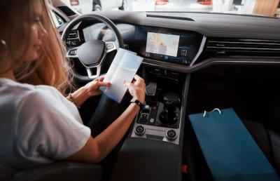 Girl in Modern Car at Daytime Indoors – Free Stock Photo for Download