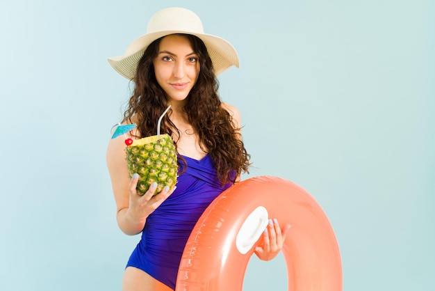 Portrait of a Beautiful Woman Enjoying a Tropical Vacation at the Beach – Free Download