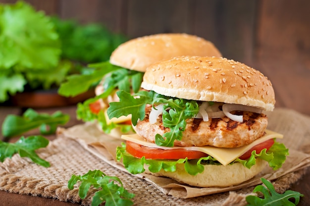 Delicious Chicken Burger Sandwich with Tomatoes, Cheese, and Lettuce – Free Download